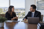 California employee consulting an employment lawyer about retaliation